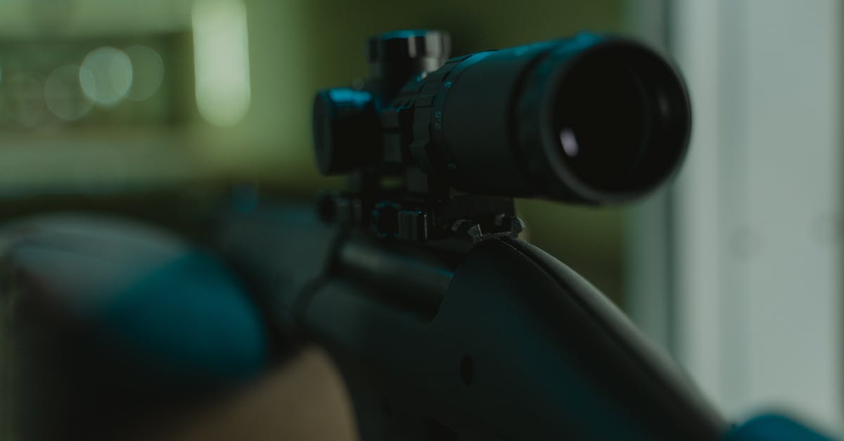 How do you zoom in on a terminal? - Black Rifle With Scope in Tilt Shift Lens