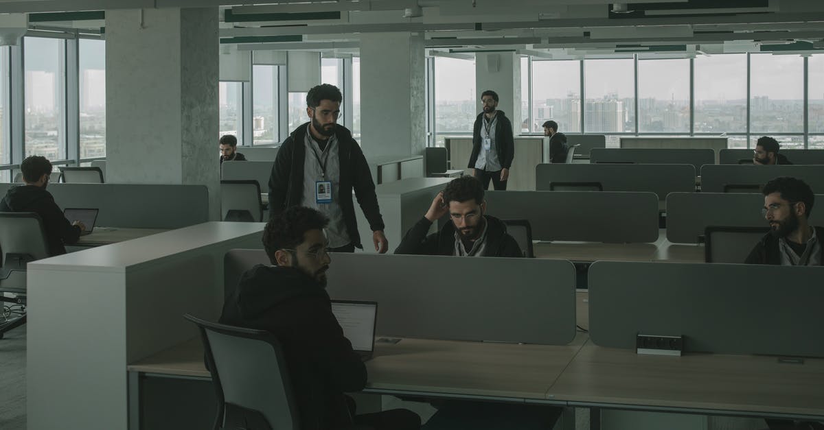 How does Counterspying work with multiple spies? - Men Looking Alike Inside an Office How does Counterspying work with multiple spies? - Men Looking Alike Inside an Office