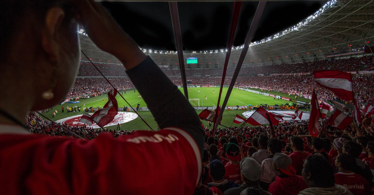 How does gaming performance affect the rarity of potions I get? - Group of People Watching Soccer Game