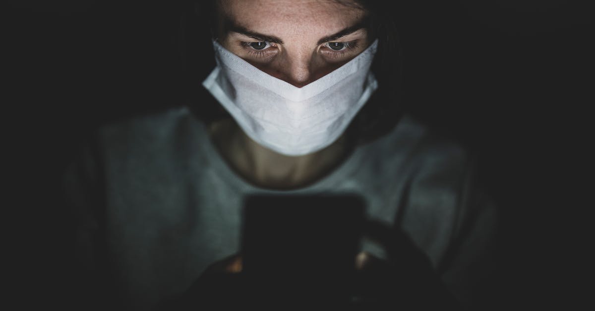 How does Infection Bio War calculate infection spreading (infecting)? - Man Wearing Face Mask Using His Phone In The Dark How does Infection Bio War calculate infection spreading (infecting)? - Man Wearing Face Mask Using His Phone In The Dark