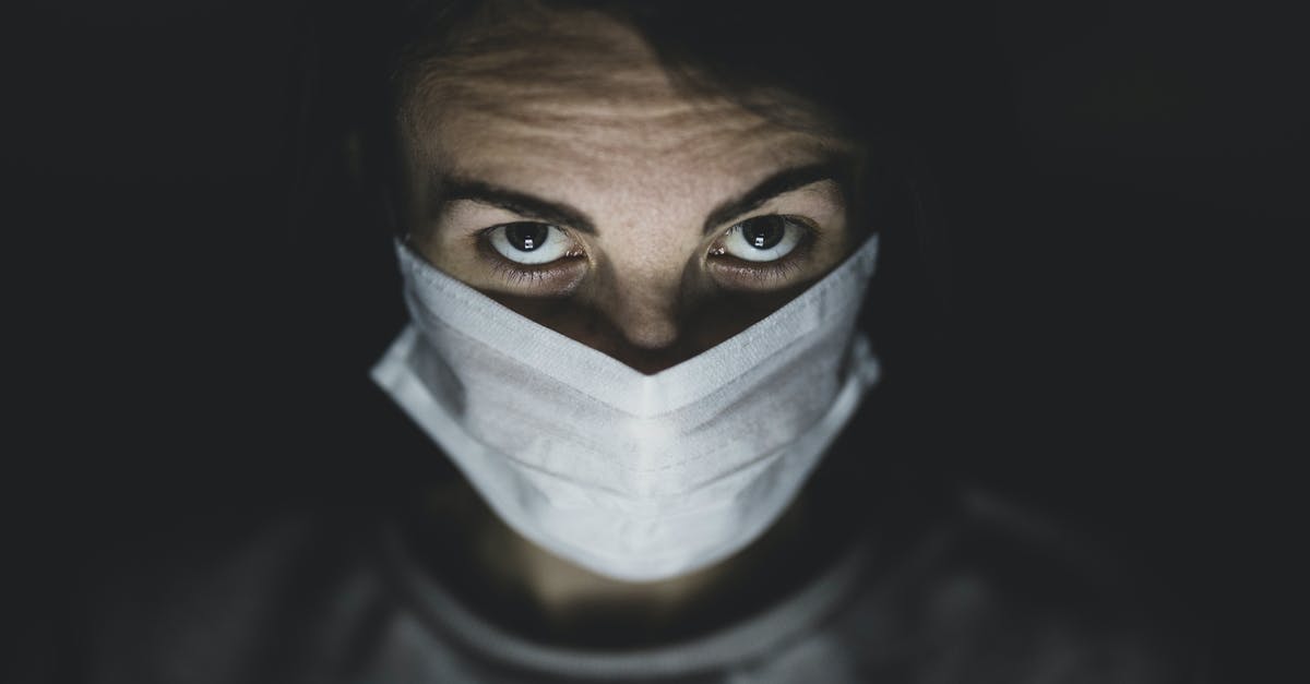 How does Infection Bio War calculate infection spreading (infecting)? - Man Wearing Face Mask In A Dark Room How does Infection Bio War calculate infection spreading (infecting)? - Man Wearing Face Mask In A Dark Room