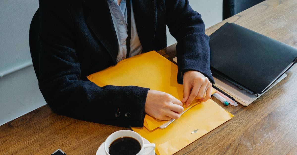 How does Lead By Example work when the squad leader has a lower will value than the rest of the squad? - Crop woman sitting at table in office