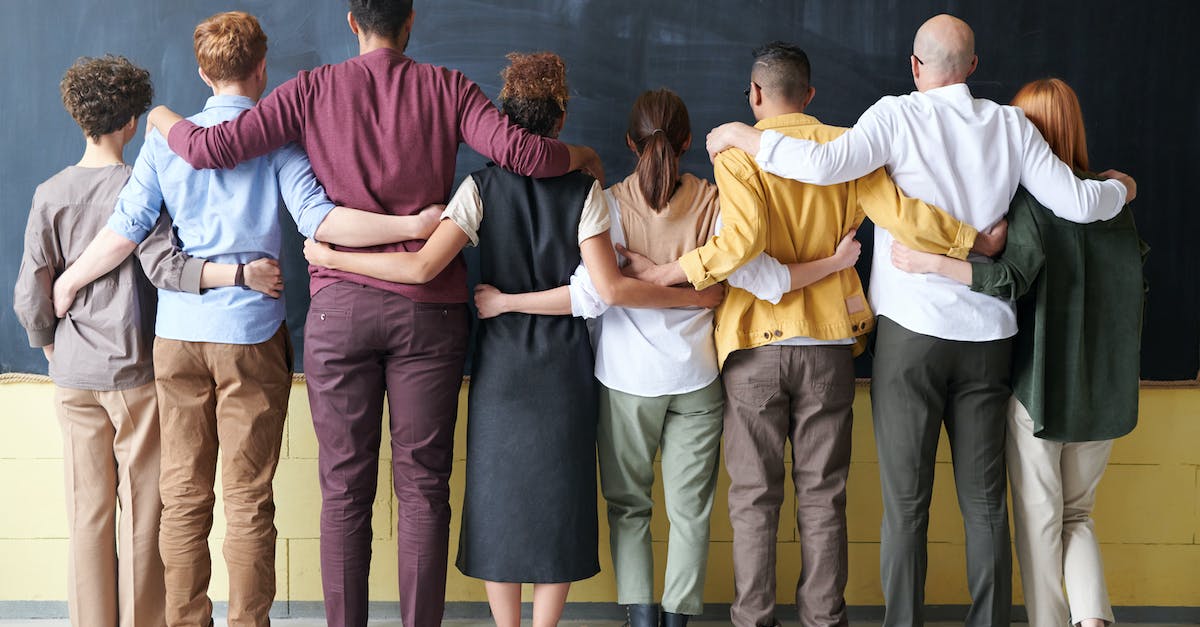 How does one obtain the Staff of Wisdom? - Group of People Standing Indoors