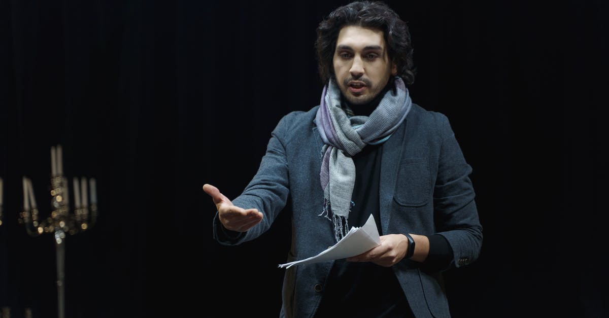 How does parrying work for a Dual-wielding character in Skyrim? - Man Holding Papers And Explaining Something