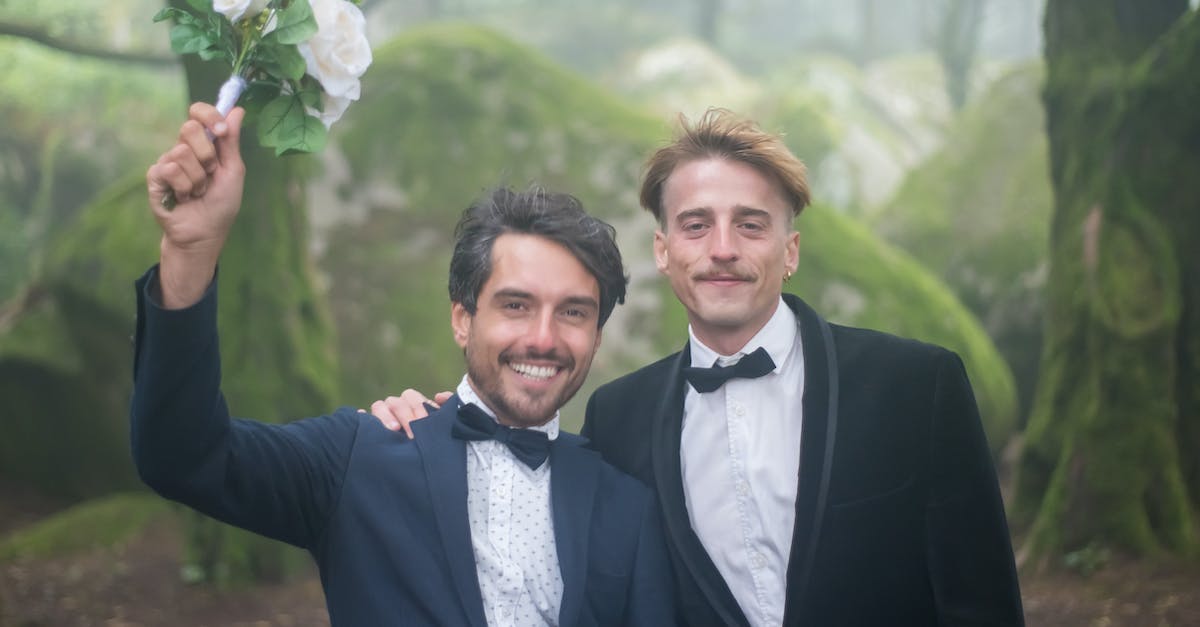 How does powerplay affect the major factions? - Man in Black Suit Jacket Beside Woman in Black Blazer