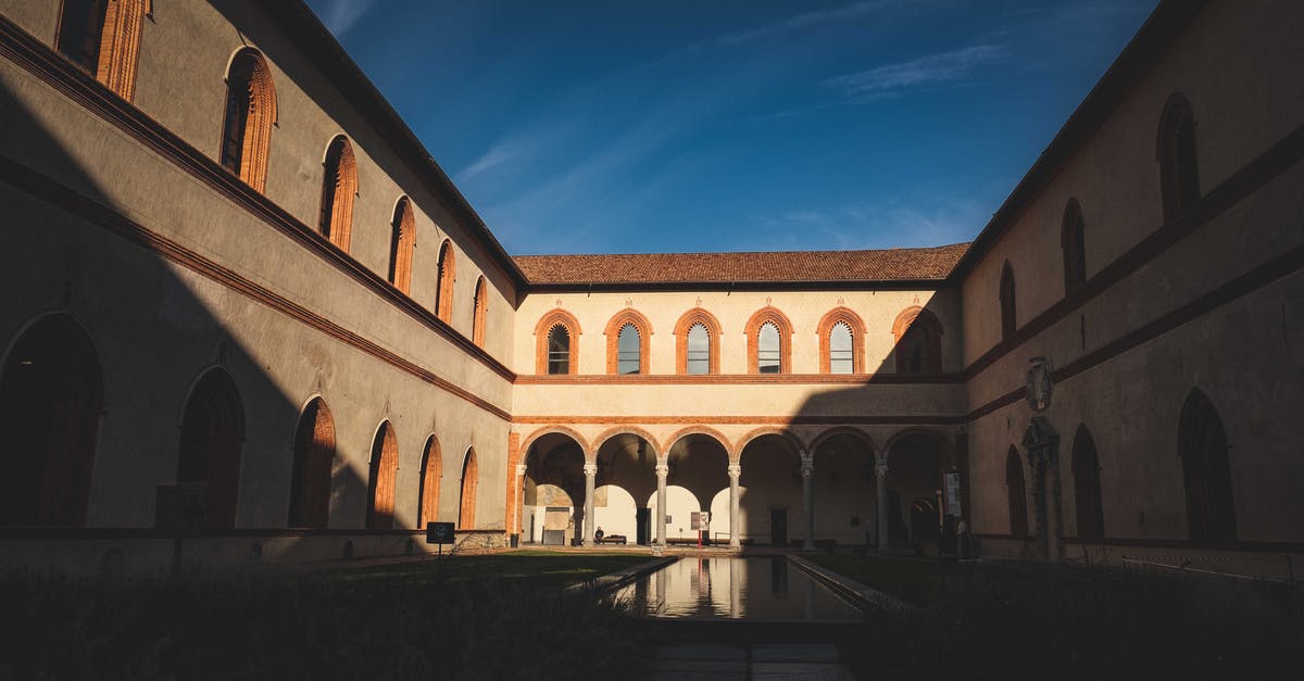 How does Ralph know about the Castle's secret garden entrance? - Garden in Ducal Courtyard of historic Castello Sforzesco with arched windows and passage against bright blue sky in Milan How does Ralph know about the Castle's secret garden entrance? - Garden in Ducal Courtyard of historic Castello Sforzesco with arched windows and passage against bright blue sky in Milan