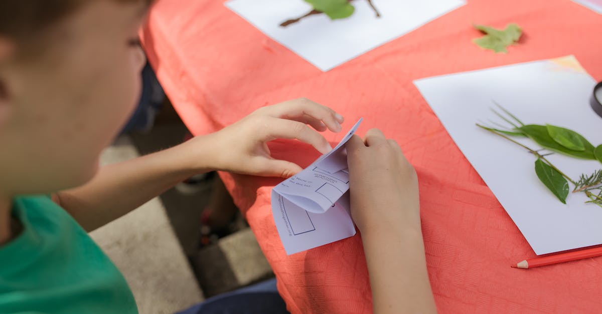 How does the Angel generation work in the Steam Version of Adventure Capitalist? - Person Holding White Printer Paper With Green Frog Drawing