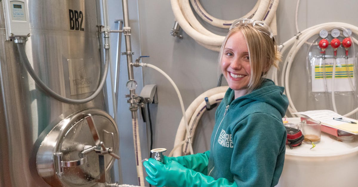 How does the brewing potion work in Minecraft? - Woman Wearing Pair of Teal Rubber Gloves Standing Near White Barrel How does the brewing potion work in Minecraft? - Woman Wearing Pair of Teal Rubber Gloves Standing Near White Barrel