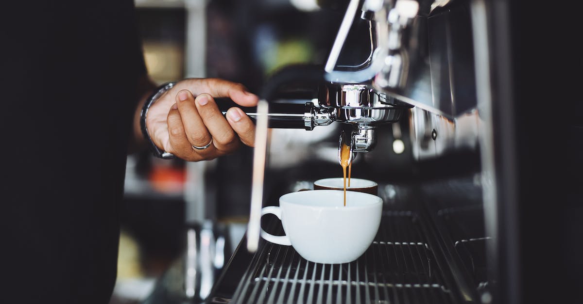 How does the degrading of the food bar work? [duplicate] - Close-up of Hand Holding Coffee Machine