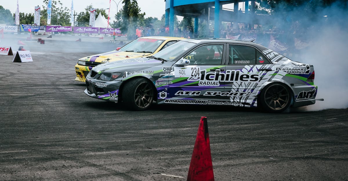 How does the Drift scoring work? - Gray and White Racing Car Drifting