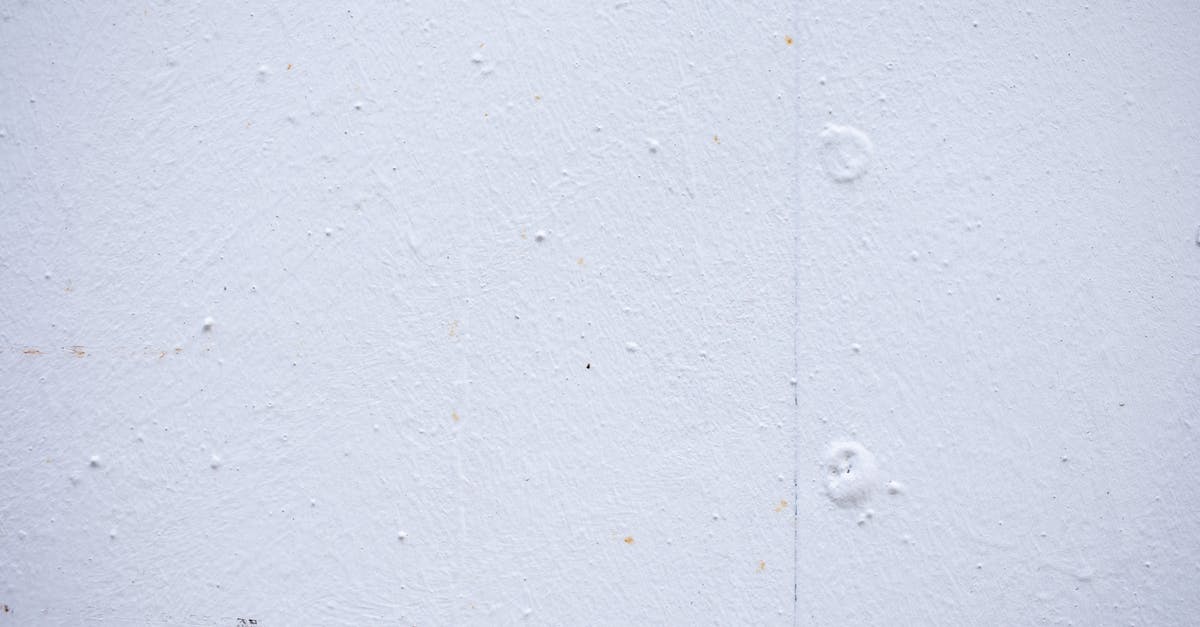 How does the elemental DoT of two weapons of the same element stack? - Textured backdrop of wall with spots and dots on shabby light blue surface