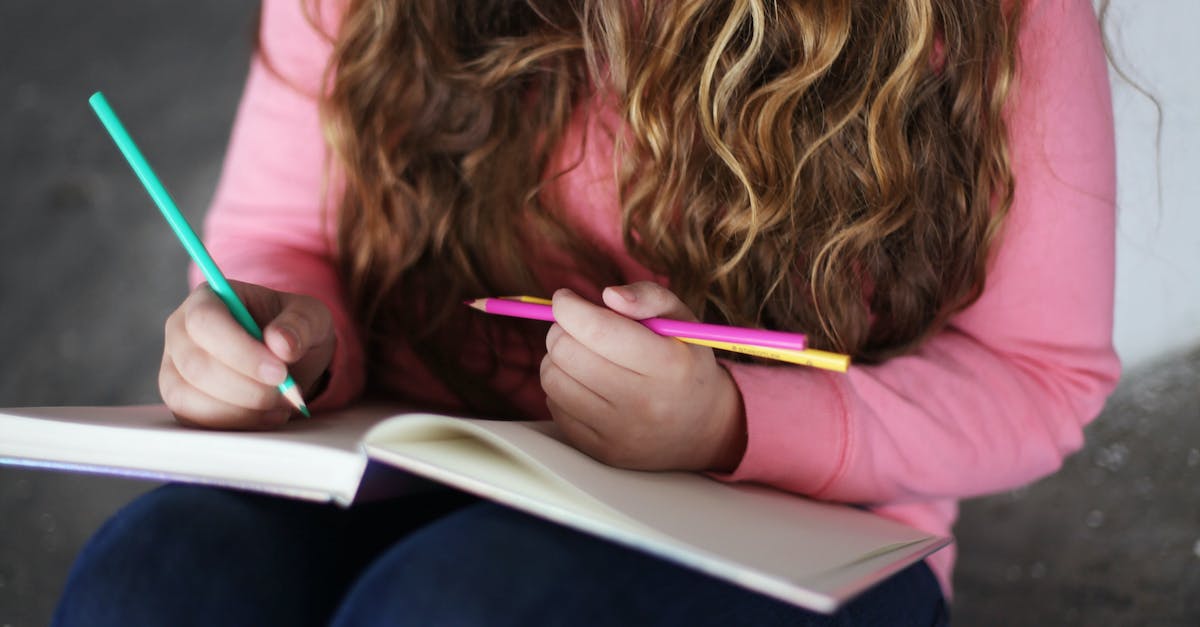 How does the Huntress's Long Range skill work? - Crop woman drawing in sketchbook