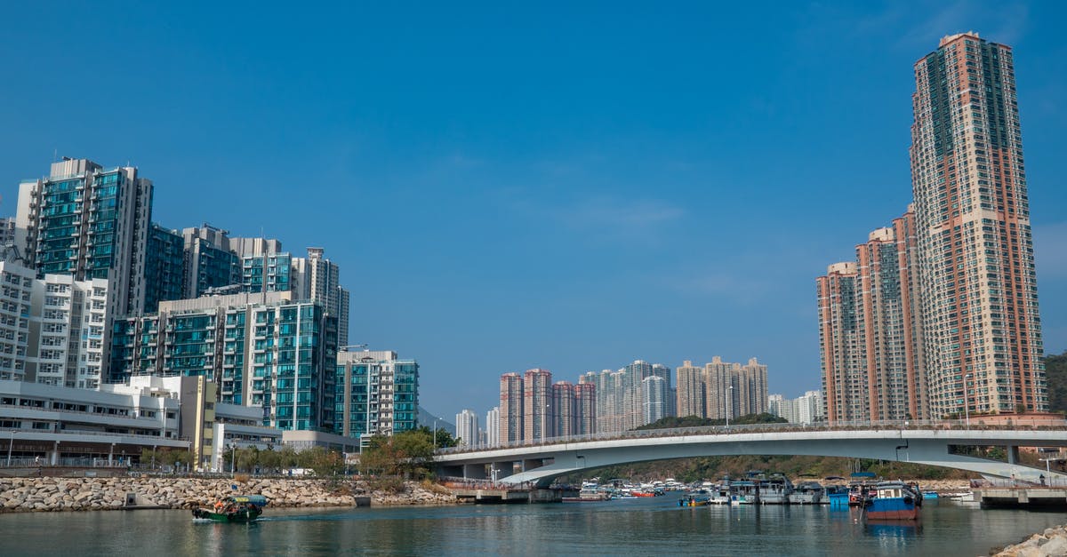 How does the plot progress in Shadowrun: Hong Kong? - City Skyline Across Body of Water