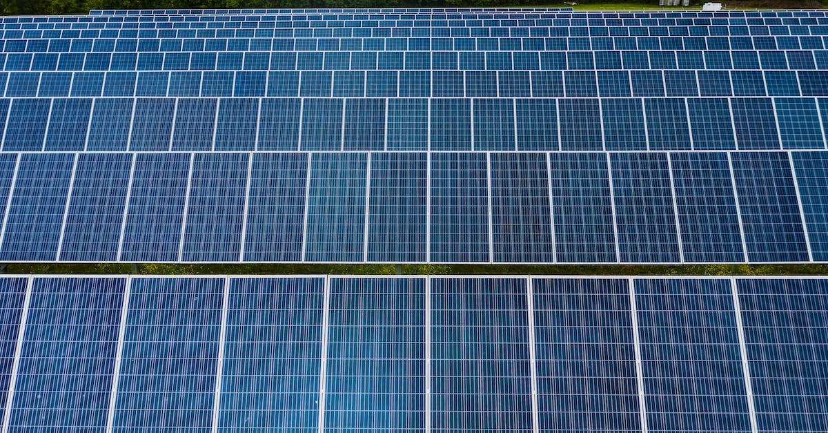 How does the save system work? - Contemporary installation of solar panels mounted on field in environmental friendly solar power station