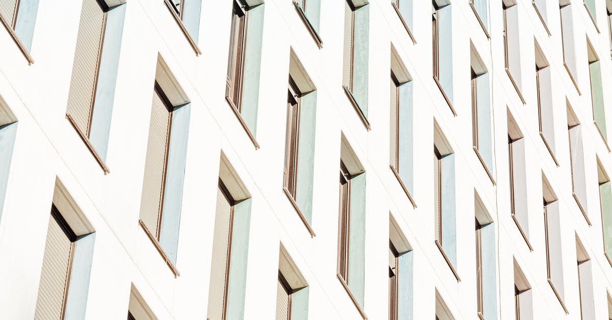 How does the Structure block work? - From below of lots of long narrow identical windows of contemporary construction in sunlight