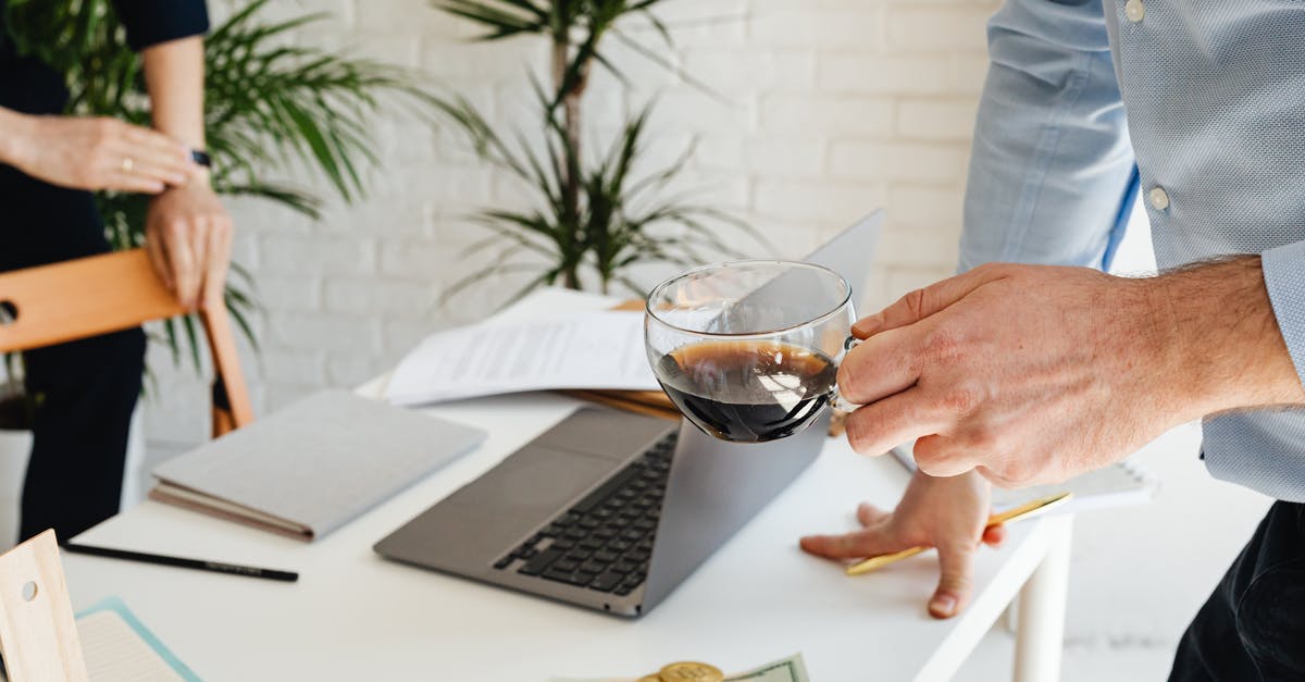 How does Transmogrifier work exactly? - Person Holding Clear Wine Glass