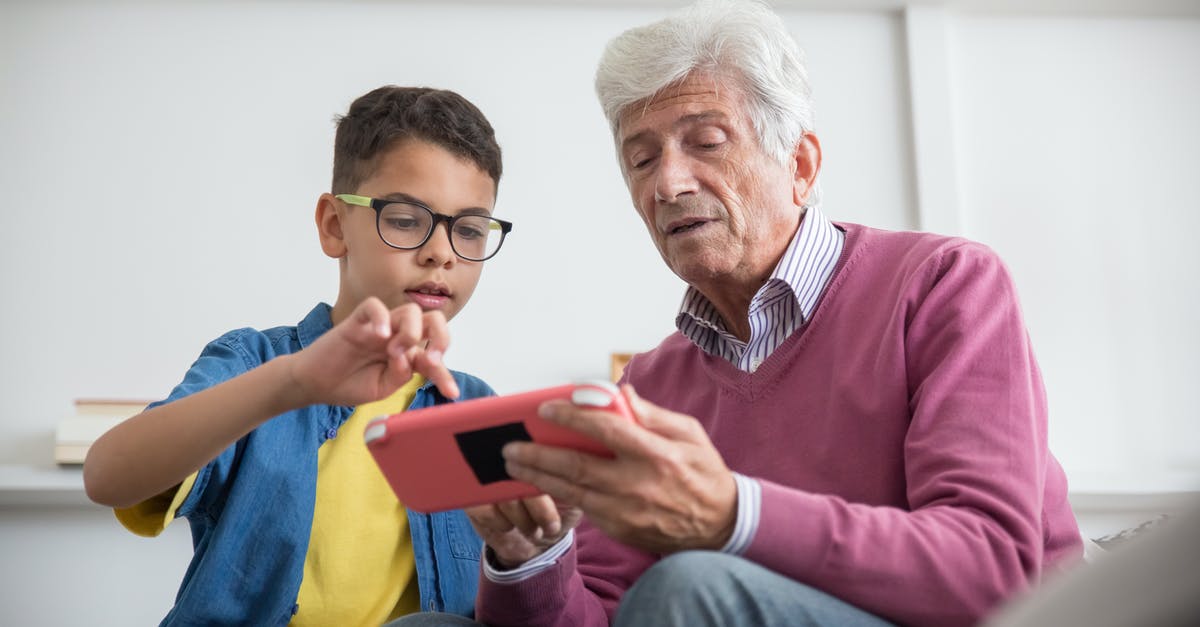 How does unavailability of a gyroscope affect gaming? - A Boy Teaching His Grandfather How to Play a Game Console