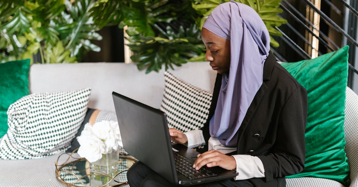 How does Veil of Discord damage amplification works? - A Woman in Hijab Working with a Laptop