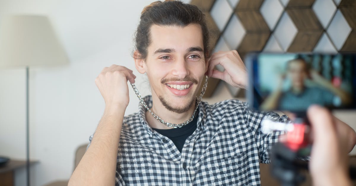 How does wager in dota2 works - Woman in Black and White Plaid Button Up Shirt Smiling