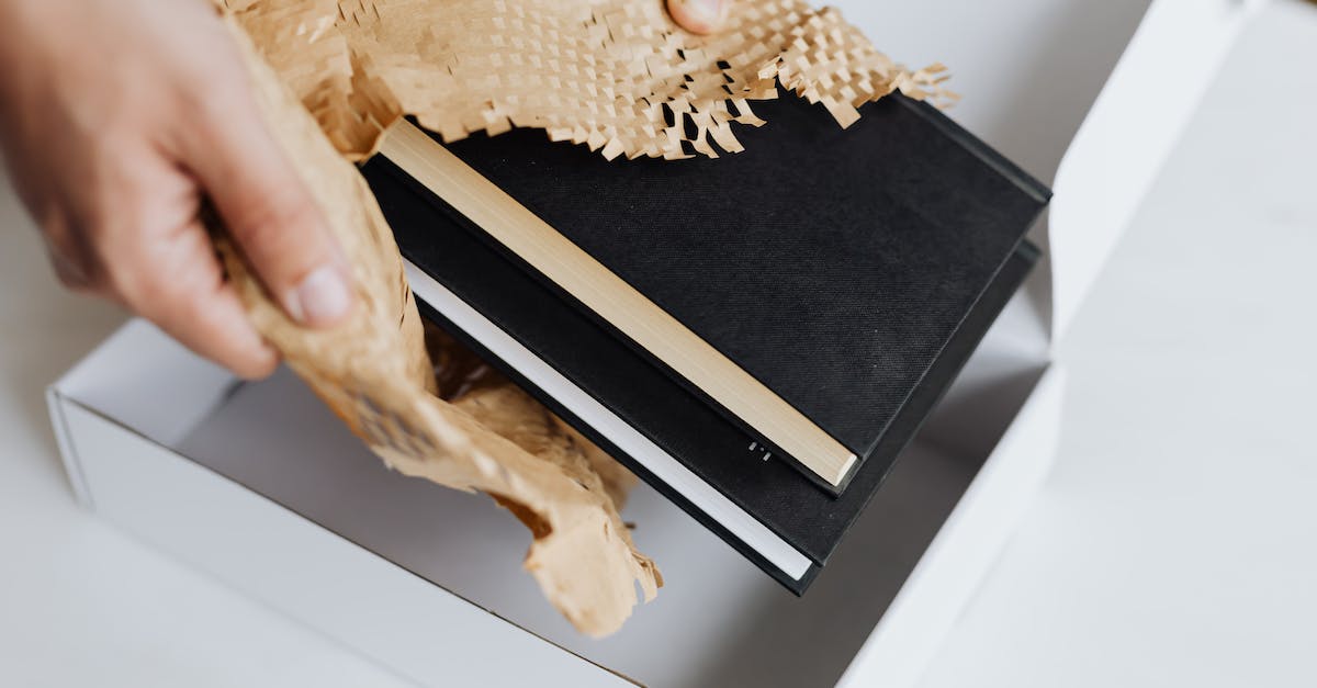 How exactly does Hwoj Wrap work with Bane of the Trapped? - Anonymous man wrapping pair of black notebooks in packing paper How exactly does Hwoj Wrap work with Bane of the Trapped? - Anonymous man wrapping pair of black notebooks in packing paper