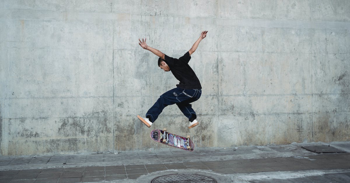 How Feasible is StarCraft 2 over LTE? - Young man jumping with skateboard above manhole near concrete wall How Feasible is StarCraft 2 over LTE? - Young man jumping with skateboard above manhole near concrete wall