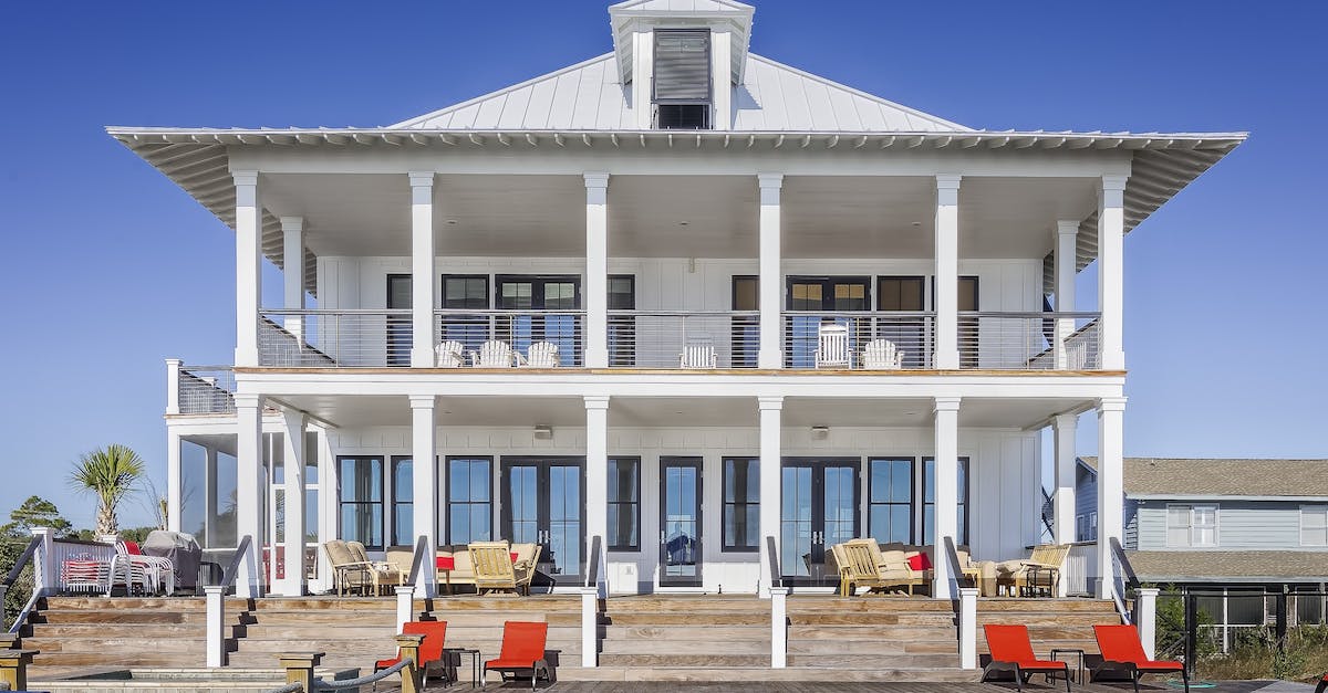 How has the mansion evolved? - White Wooden Building