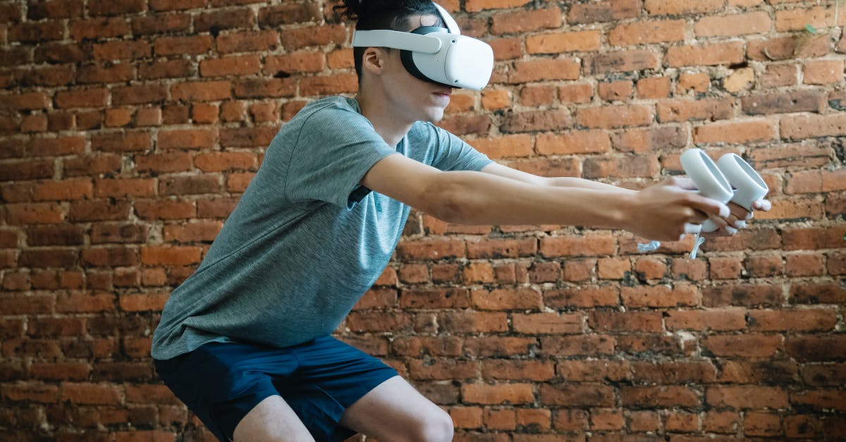 How is 3DS' online gaming experience affected by China's Great Firewall? - Side view of unrecognizable young male in casual clothes using goggles of virtual reality controlling with console while standing in room How is 3DS' online gaming experience affected by China's Great Firewall? - Side view of unrecognizable young male in casual clothes using goggles of virtual reality controlling with console while standing in room