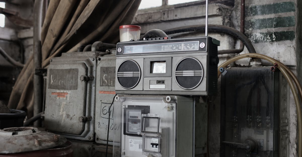 How is converted damage calculated? - Old fashioned cassette player placed in shabby garage near old industrial equipment