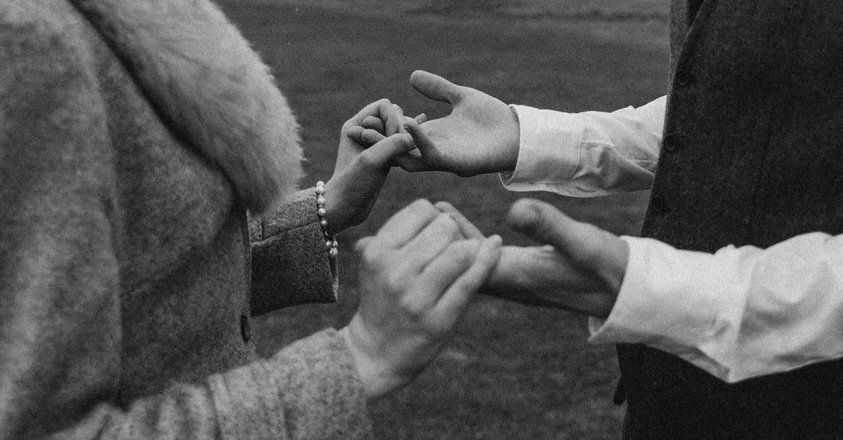 How is overwatch triggered, and how is it affected by cover? - Monochrome Photo Of People Holding Hands