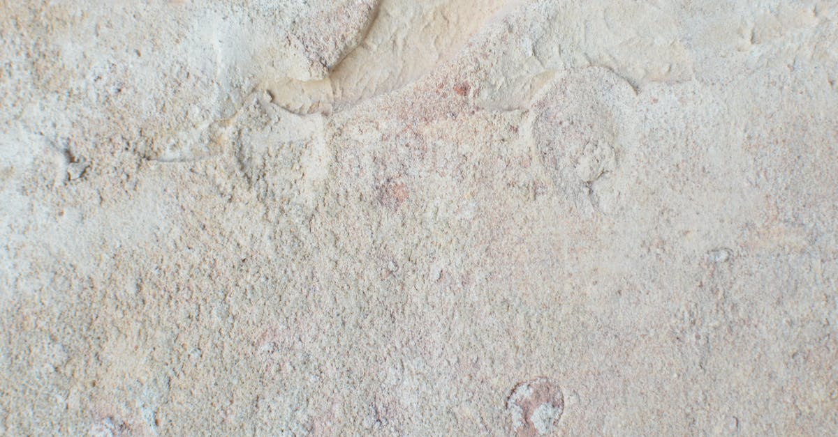 How is the damage reduction calculated from armor/mr? [duplicate] - From above of abstract backdrop of old wall with beige stucco and uneven surface with dense texture