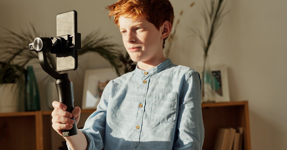 How is the shooting and hitting managed in common shooter online multiplayer games? [closed] - Boy in Blue Dress Shirt Holding Black Selfie Stick