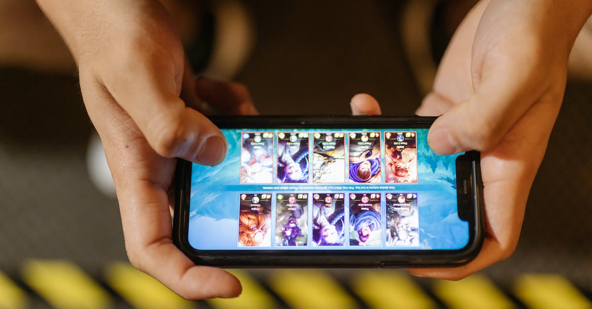 How is the shooting and hitting managed in common shooter online multiplayer games? [closed] - Close-Up View of a Person Playing League of Legends