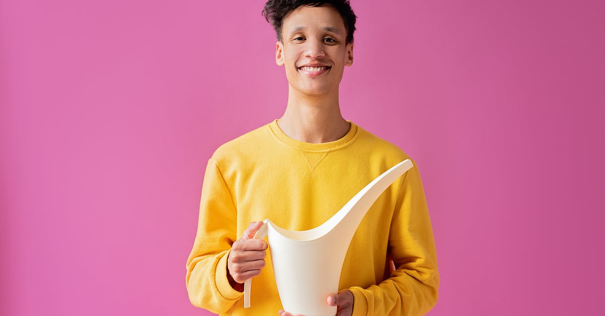 How long after accepting tribute can I attack an enemy civ? - A Handsome Young Man Holding a Long Spout Plastic Watering Can