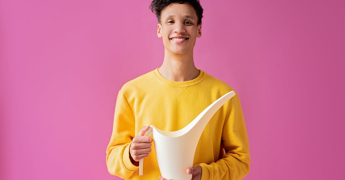 How long can a champion be in stasis? - A Handsome Young Man Holding a Long Spout Plastic Watering Can