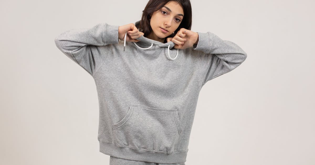 How long do de/buffs last in Pocket Mortys? - Serious female wearing oversize hoodie and sweatpants standing against white background and looking at camera How long do de/buffs last in Pocket Mortys? - Serious female wearing oversize hoodie and sweatpants standing against white background and looking at camera