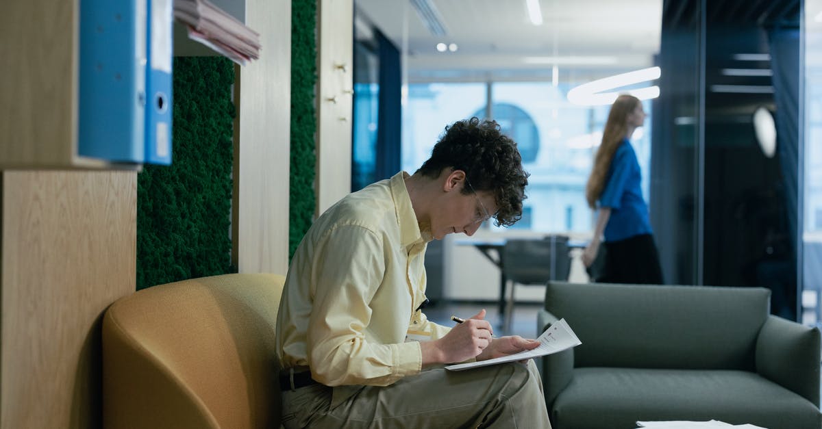 How long do grenade donations take to explode? - Man in Yellow Long Sleeves Sitting on Brown Couch