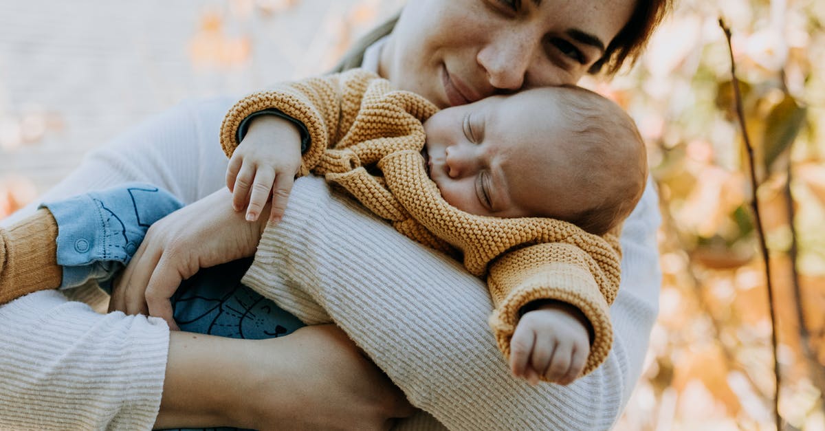 How long do sleeping bonuses last? - Woman Hugging her Sleeping Baby