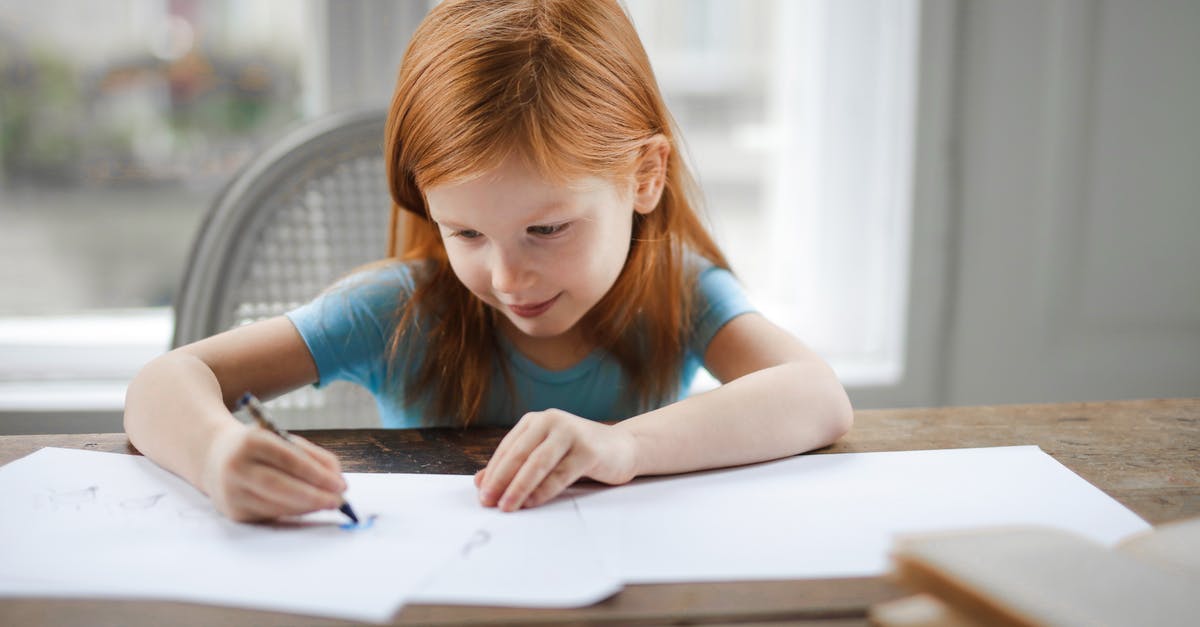 How long does it take to fully draw a bow in Minecraft? - Diligent small girl drawing on paper in light living room at home