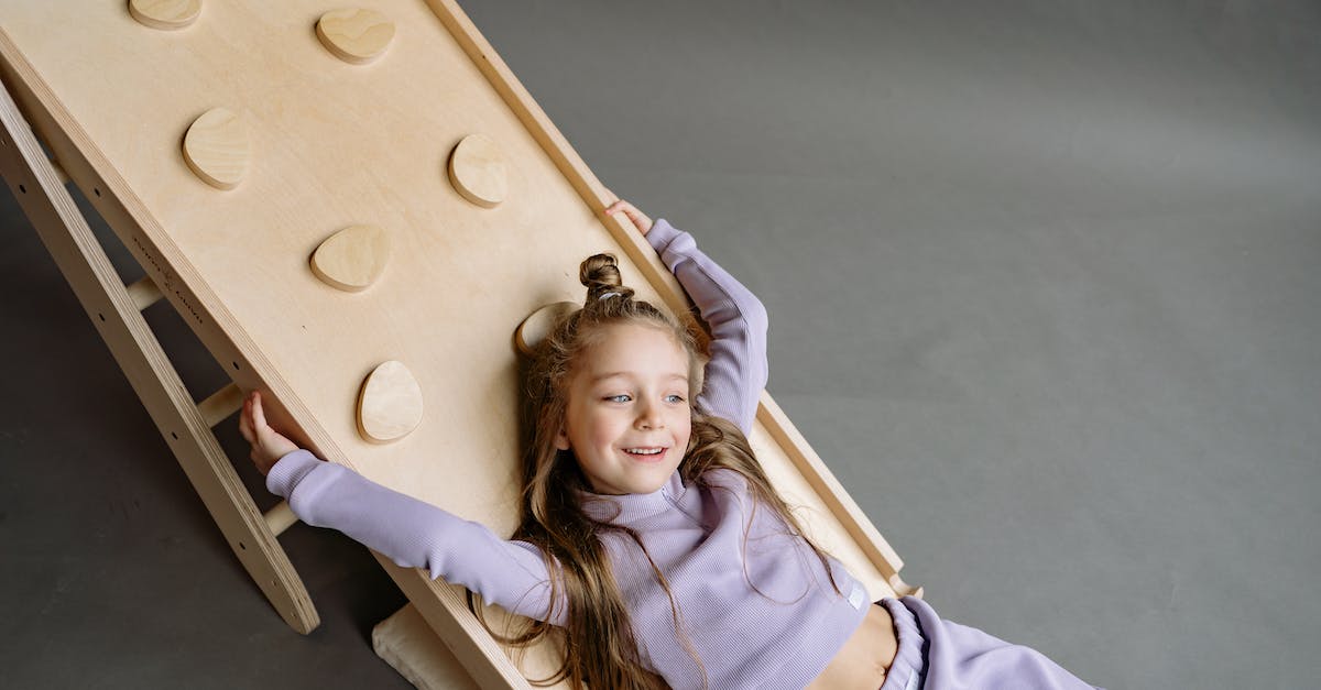 How long does it take to unlock another frame by playing one of the base frames? - Young Girl Lying on a Wooden Climbing Frame