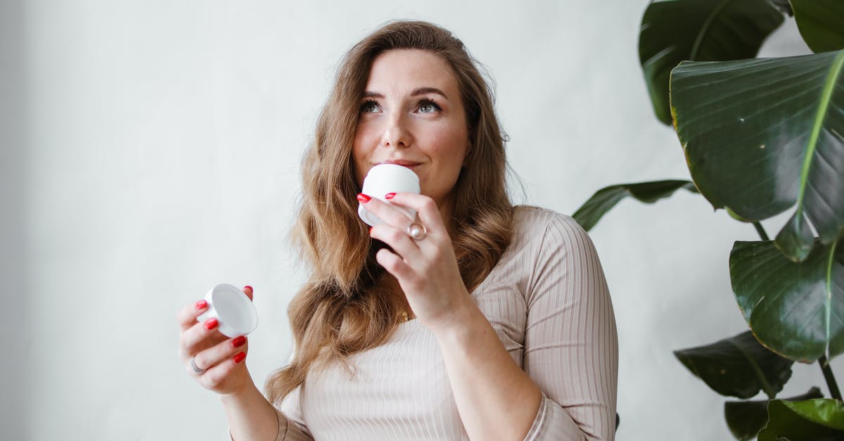 How long is overtime? - Woman Smelling a Facial Cream How long is overtime? - Woman Smelling a Facial Cream
