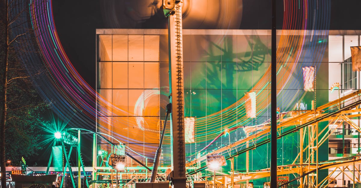 How long will the dark events in xcom 2 stay active? - Ferris wheel and carousels in illuminated amusement park