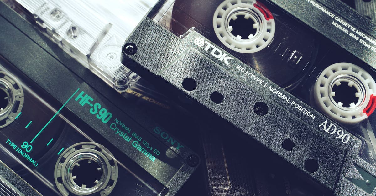 How many cassette tapes are there, and where are they found? - Black Audio Tapes In Close-Up View