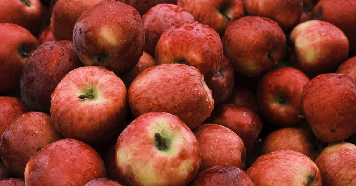 How many contribution points do I need to level up my faction rank? - Red Apples on White Plastic Container