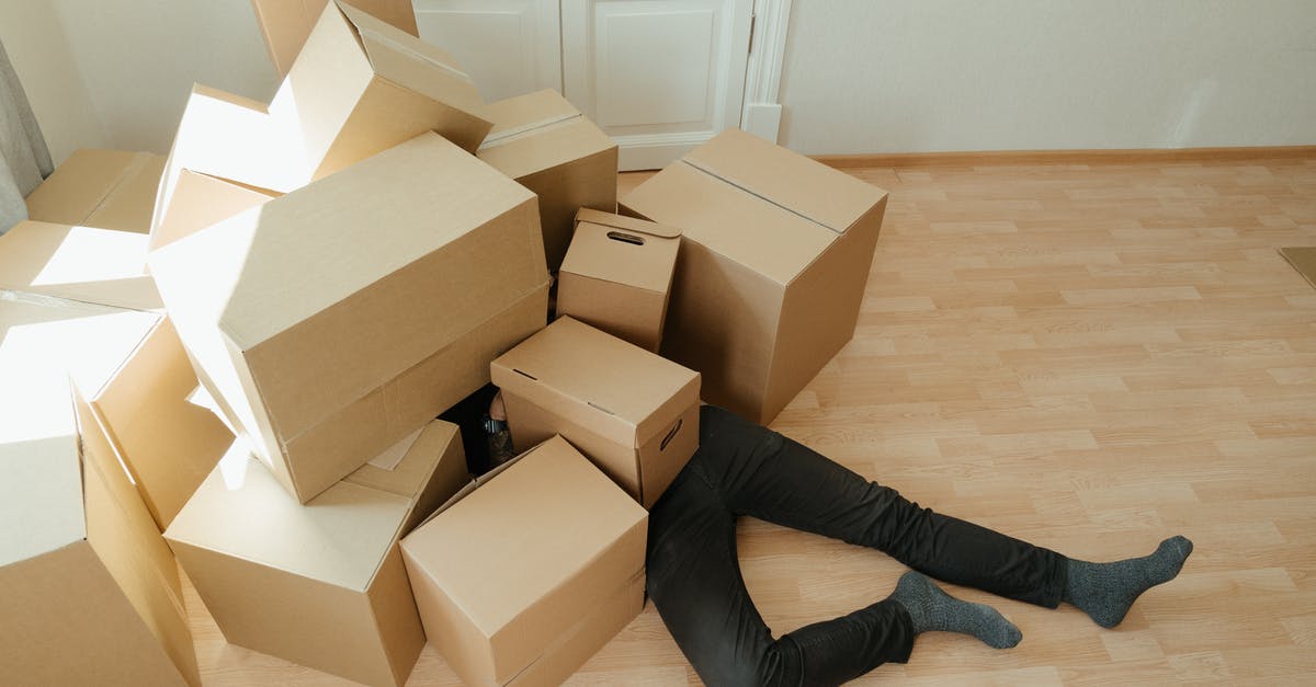 How many copies of Jackbox Party Pack 3 are needed for two households? - Brown Cardboard Boxes on Brown Wooden Floor How many copies of Jackbox Party Pack 3 are needed for two households? - Brown Cardboard Boxes on Brown Wooden Floor