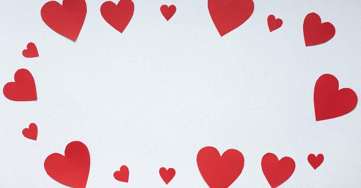 How many days are there in the Papers Please story? - Top view paper cutout of different sizes red paper hearts forming oval placed on white background during valentines day celebration concept How many days are there in the Papers Please story? - Top view paper cutout of different sizes red paper hearts forming oval placed on white background during valentines day celebration concept