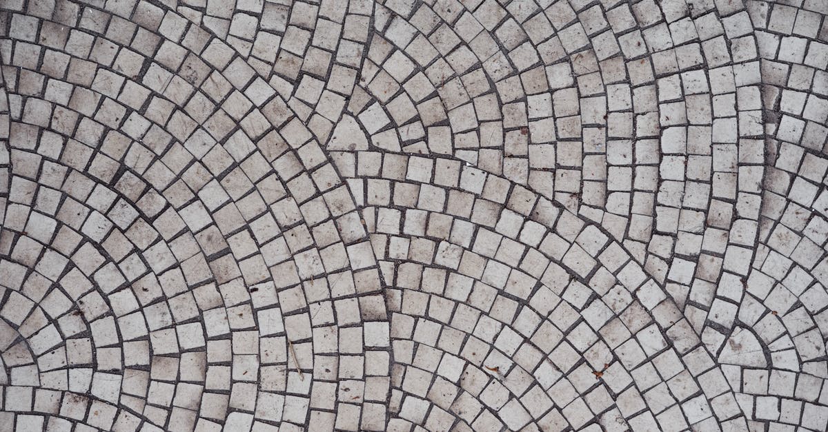 How many doomed units does each square take to corrupt? - Mosaic old gray ceramic tile with round pattern