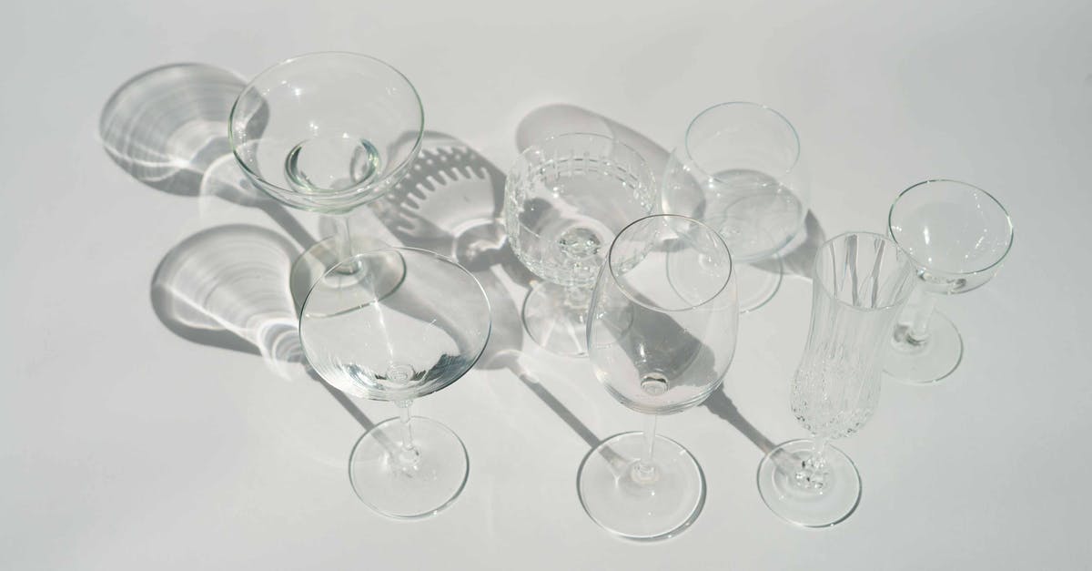 How many extra pellets are fired from a Two Shot Prefix Shotgun? - High angle of transparent different glasses for various cocktails and beverages in white studio How many extra pellets are fired from a Two Shot Prefix Shotgun? - High angle of transparent different glasses for various cocktails and beverages in white studio