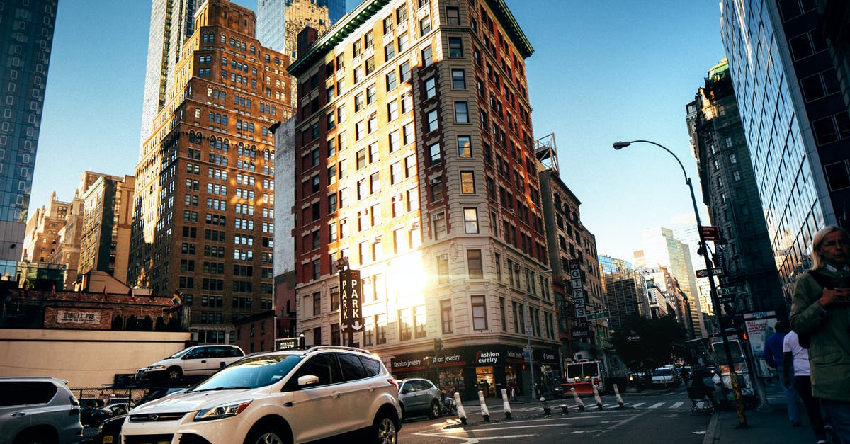 How many free cars are there, and where do I get them? - Suv Traveling On Road Near Flatiron Building