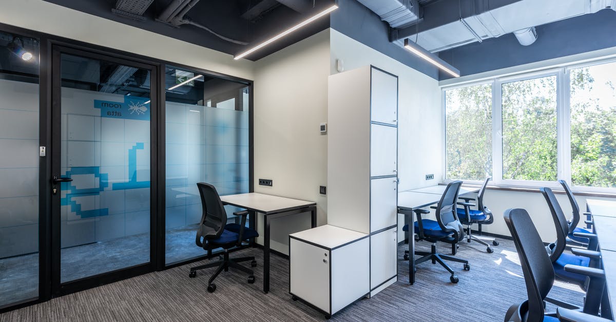 How many offices are there, and how much do they each cost? - Desks with armchairs placed in spacious open space office with glass doors and white cupboards near big window in business center How many offices are there, and how much do they each cost? - Desks with armchairs placed in spacious open space office with glass doors and white cupboards near big window in business center