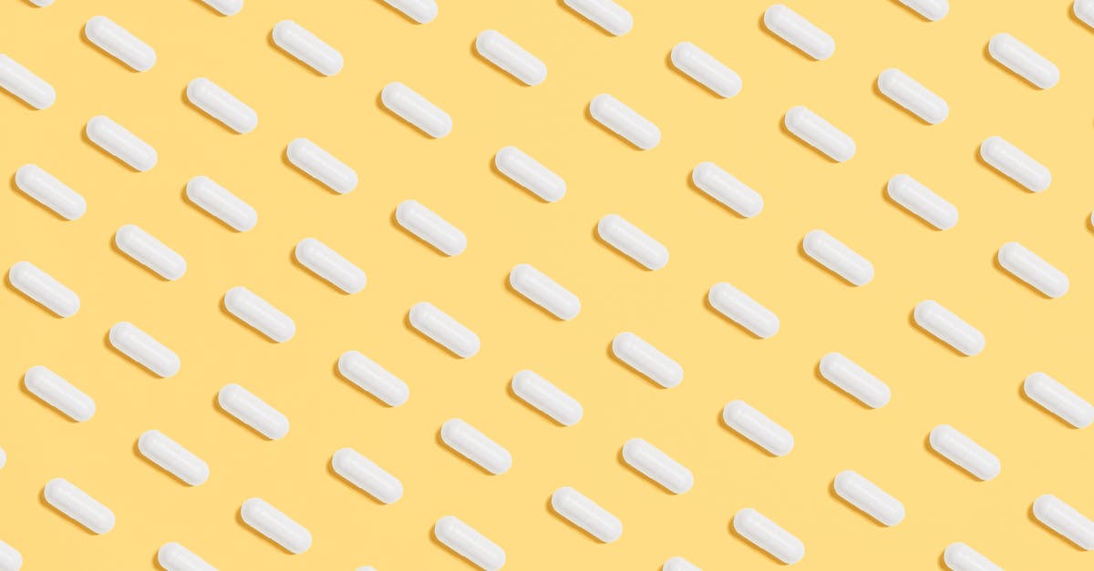 How Many Passengers? - White Capsules on Yellow Background How Many Passengers? - White Capsules on Yellow Background